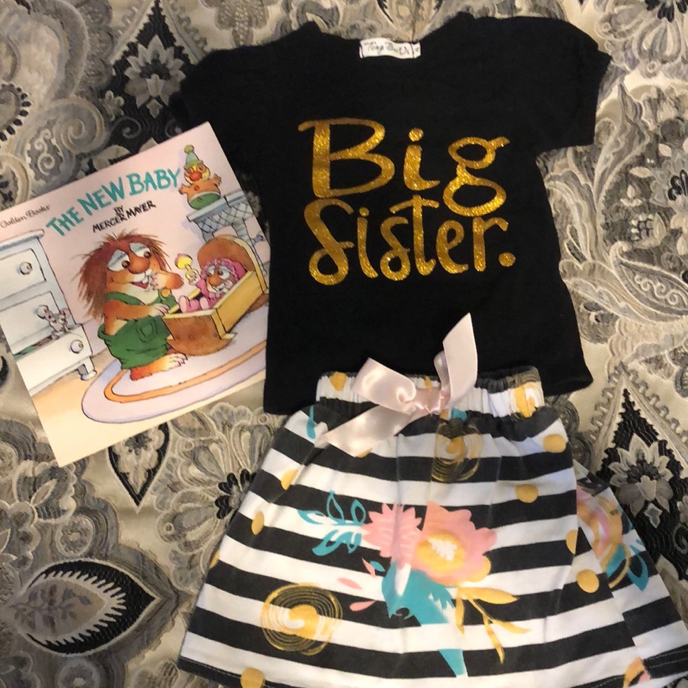 Big Sister outfit with The New Baby book